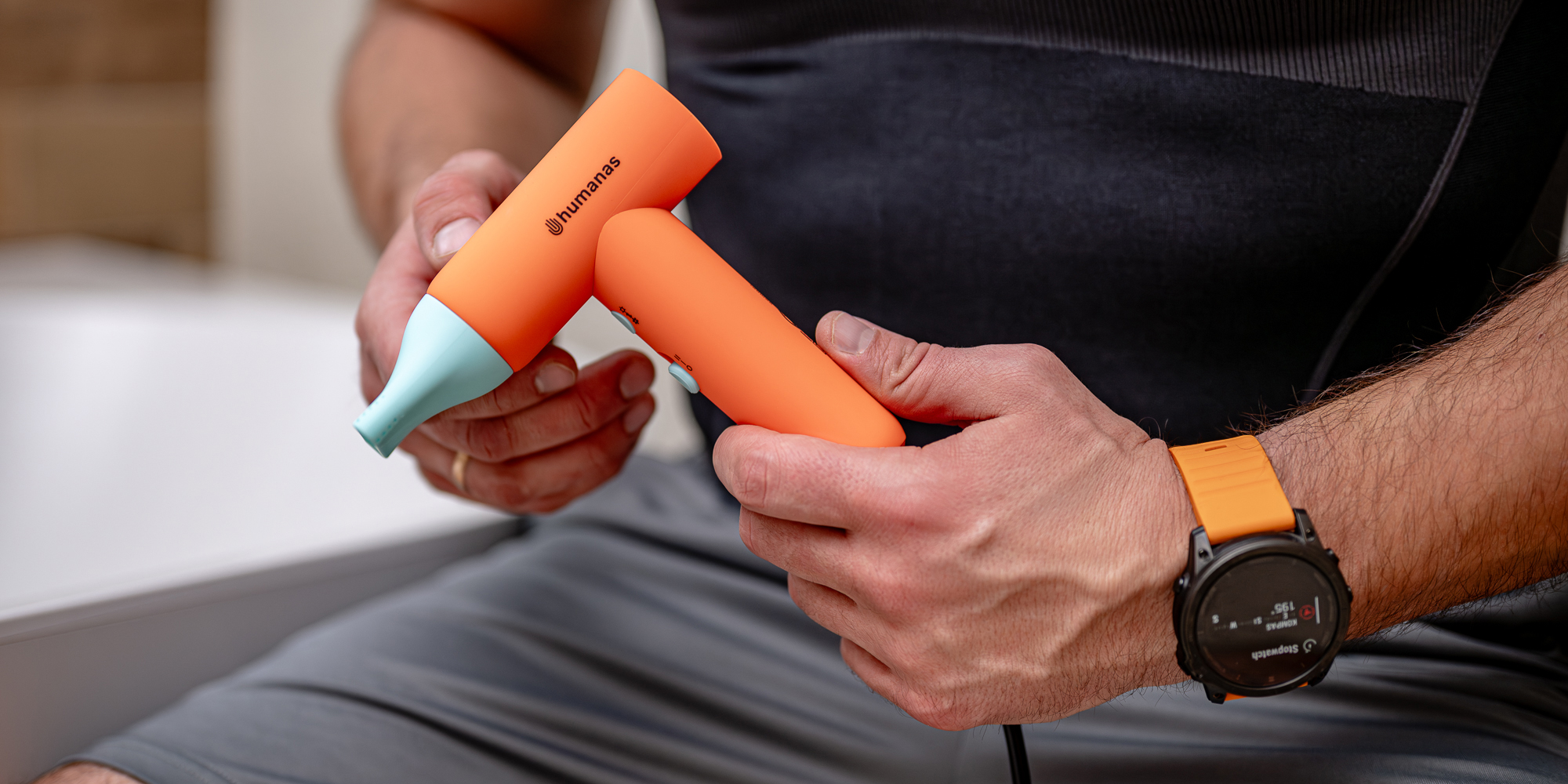 Suszarka do włosów z funkcją jonizowania Humanas AirTouch HD-AT03 mini - pomarańczowa